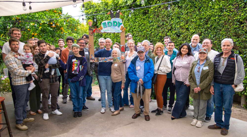 Eddy with his supporters